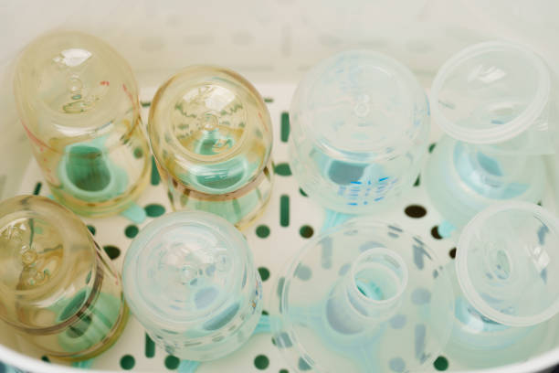 istock plastic baby milk bottle in Steam sterilizer 1518350413