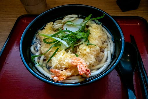 Shrimp Tempura Udon: A delightful combination of crispy shrimp tempura and thick, chewy udon noodles, served in a flavorful and comforting broth.