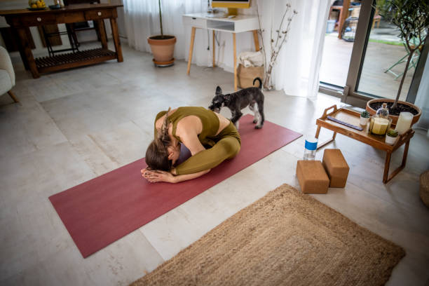 istock Woman stretching during yoga practice 1518406825