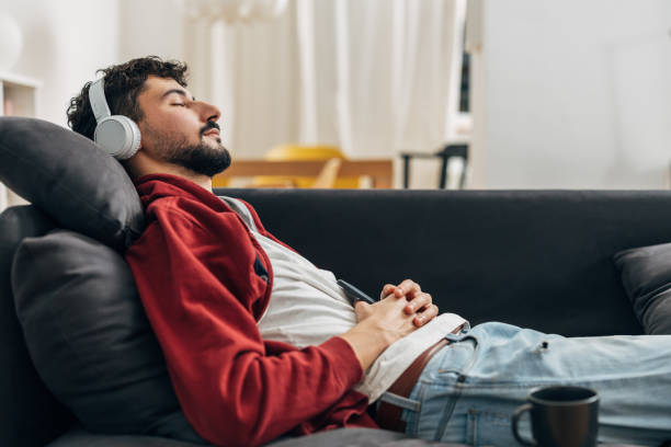 istock young adult man at home 1518440535