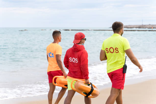istock Team of Lifeguards on duty on a beach 1518481525