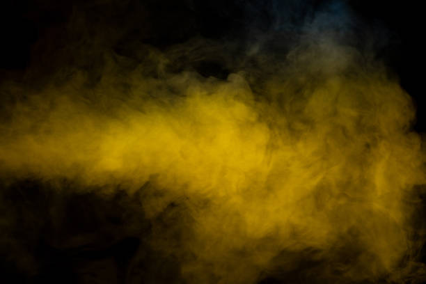 istock Yellow steam on a black background. 1518497606