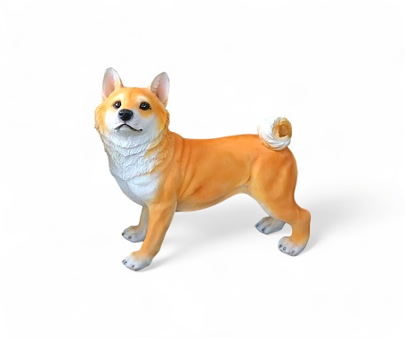 Miniature shiba inu dog toy side view isolated on white