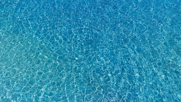 istock Tropical beach water  with crystal clear water on beach background 1518500234