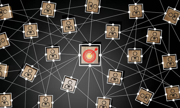 istock Red dartboard and red arrow connection linkage with human icon for customer focus target group and customer relation management concept. 1518534034