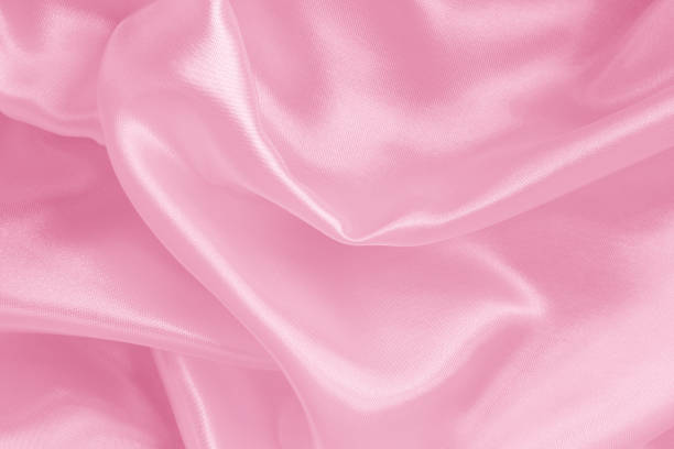 istock Pink fabric cloth texture for background and design art work, beautiful crumpled pattern of silk or linen. 1518539279