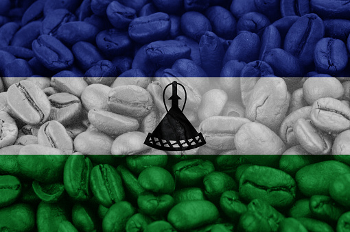 lesotho Flag on background coffee beans