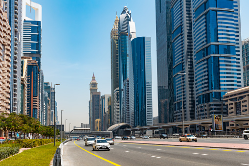Dubai, United Arab Emirates - April 25th 2023: View into the Sheikh Zayed Road with skyscrapers.