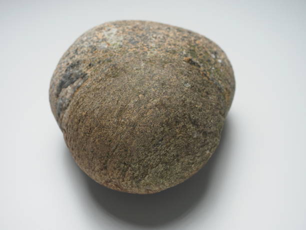 istock Large stone on white background, close-up, macro photography. 1518599340