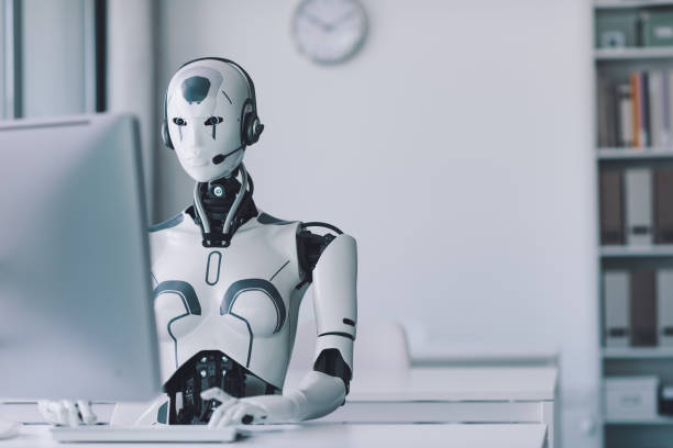 istock AI robot working in the office 1518653235