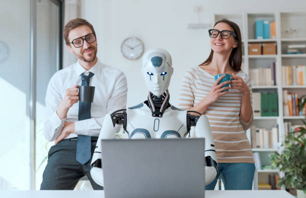 Business people supervising a robot work