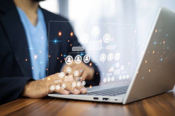 istock Business team management concept, Businessman touch visual screen for organization group of employee manage manpower to success in business strategy. Leader project team management, HR human resource 1518690411