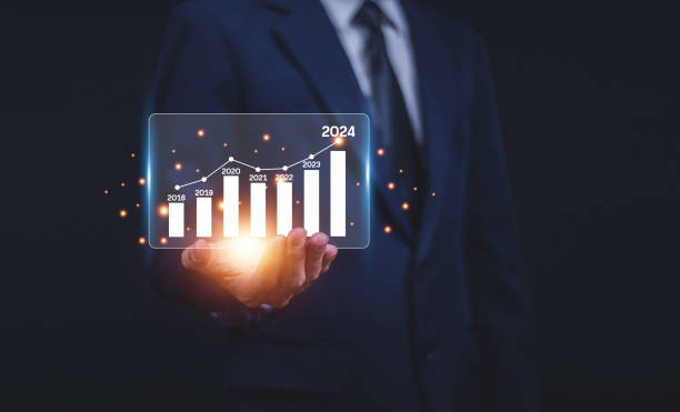 istock Business growth for year plan in 2024 concept, Businessman with graph chart for plan business 2024 growth to target. Business on 2024 plan. 1518691487