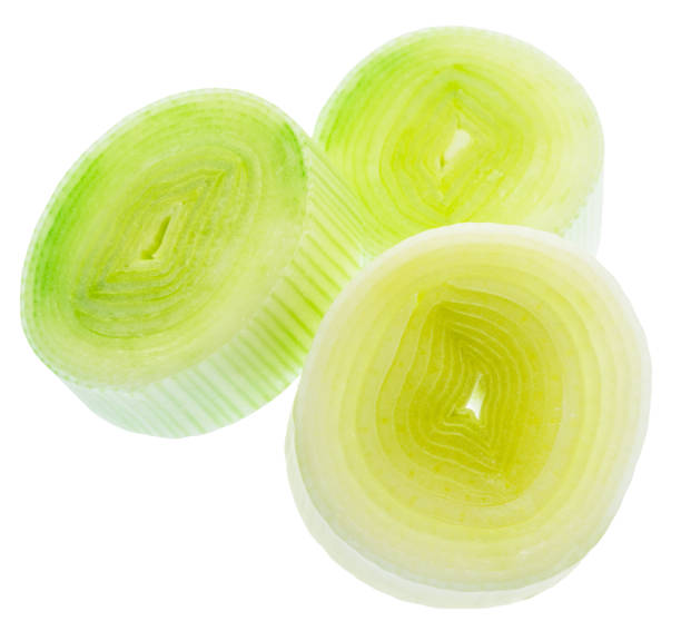 istock Fresh chopped leek isolated on white background. File contains clipping path. 1518696653