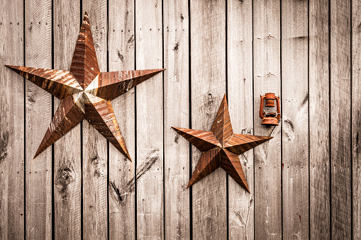 Rusted confederate stars on a barn door in Nolensville, Tennessee.