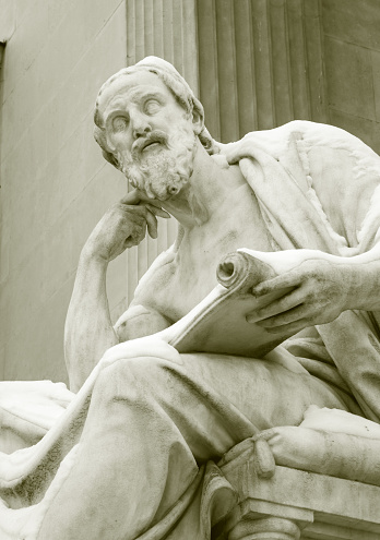 Vienna - The philosopher statue in front of the Parliament building in winter - Herodotus