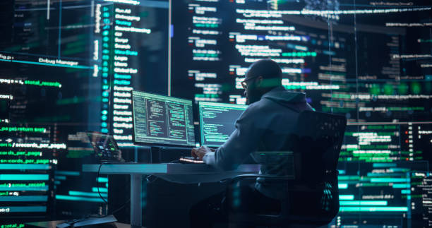 Black Male Developer Thinking and Typing on Computer, Surrounded by Big Screens Showing Coding Prompts. Professional Programmer Creating Software, Running Coding Tests. Futuristic Programming Concept desarrollador negro pensando y escribiendo en la computadora, rodeado de pantallas grandes que muestran indicaciones de codificación. programador profesional creando software, ejecutando pruebas de codificación. concepto de programación futurista