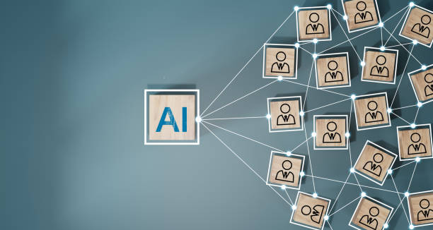istock AI network with people. Wooden cube block with AI, Artificial Intelligence,System Artificial intelligence an artificial intelligence chatbot, Digital chatbot, robot application, conversation 1518868668