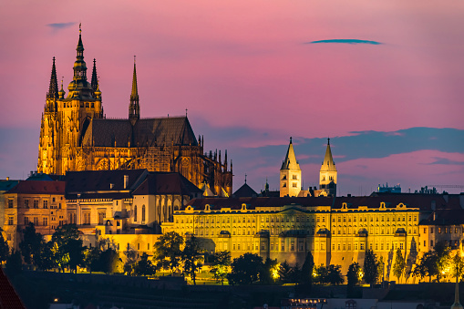 Aerial view over Church of Our Lady before Tyn, Old Town and Prague Castle at sunset in Prague, Czech Republic 