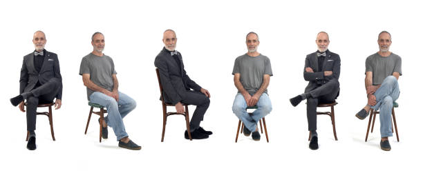 istock the same middle aged man seated in profile and front dressed in a suit and jeans and a t-shirt on white backgrouond 1518892002