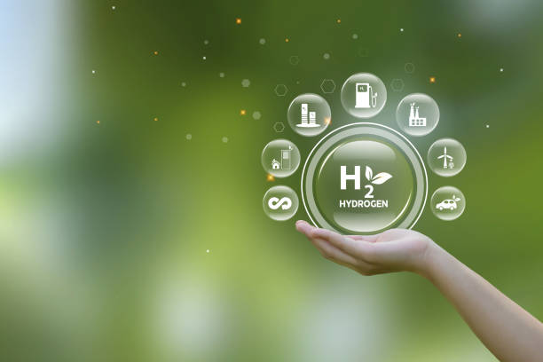 istock Hand holding bubbles with H2 hydrogen icons for Clean hydrogen energy concept.Environment, eco friendly industry and alternative energy. net zero target. Reducing greenhouse gas emissions. 1518926050