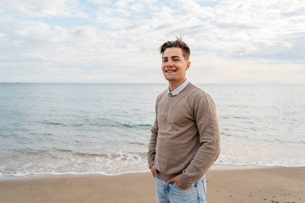 istock Young Man On The Beach In Greece 1518954382
