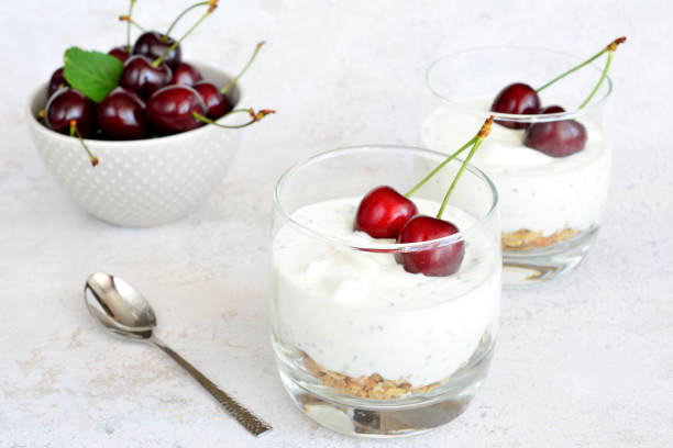 istock chia pudding with cherry and muesli in drinking glasses, close up 1518965611