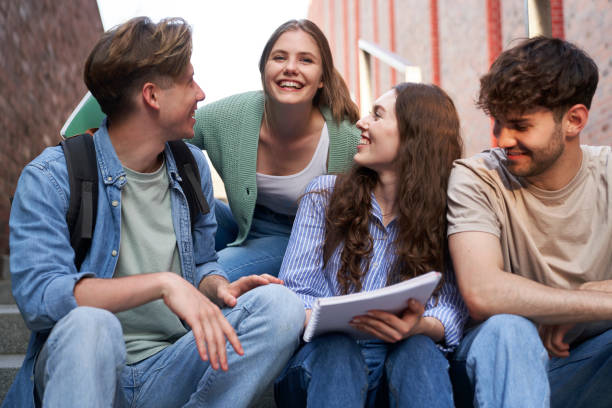 istock Group of caucasian students studying outside the university campus 1518974625