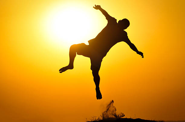 istock Man in the sunset jump and shout 151901245