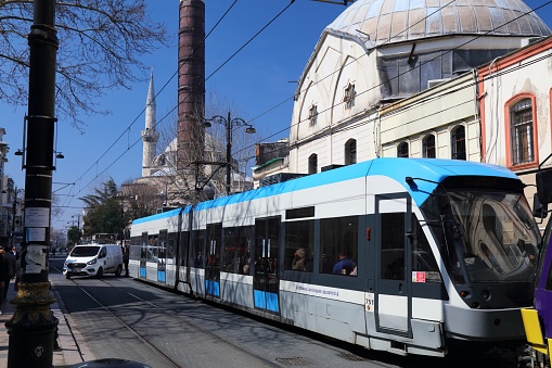 Public transportation electric tram line T1 in Cemberlitas neighborhood of Istanbul, Turkey.