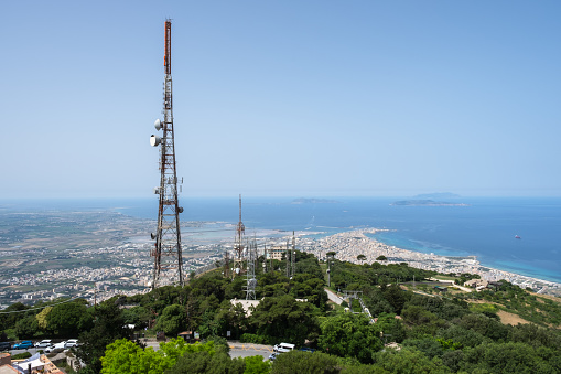 View from the mountain Erice on the communication towers of cellular communication and the coast of Sicily, Italy