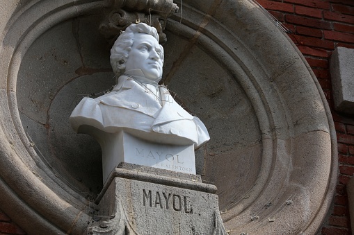 Bust of a famous Catalan artist in the facade of Parliament of Catalonia in Barcelona, Spain. Salvador Mayol was a painter.