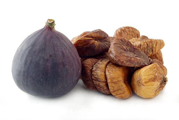 frischen feigen und getrocknete früchte - dried fig brown color image dried food stock-fotos und bilder