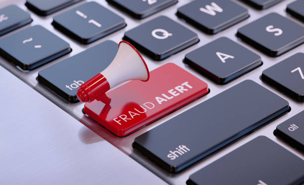 istock Red Megaphone On Fraud Alert Written Computer Keyboard 1519064182