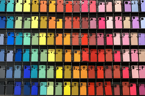 colorful mobile phone cases on the store shelf