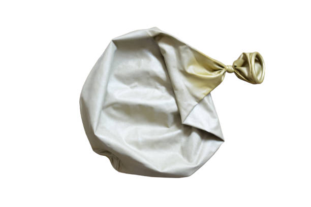 Burst balloon isolated on a white background.