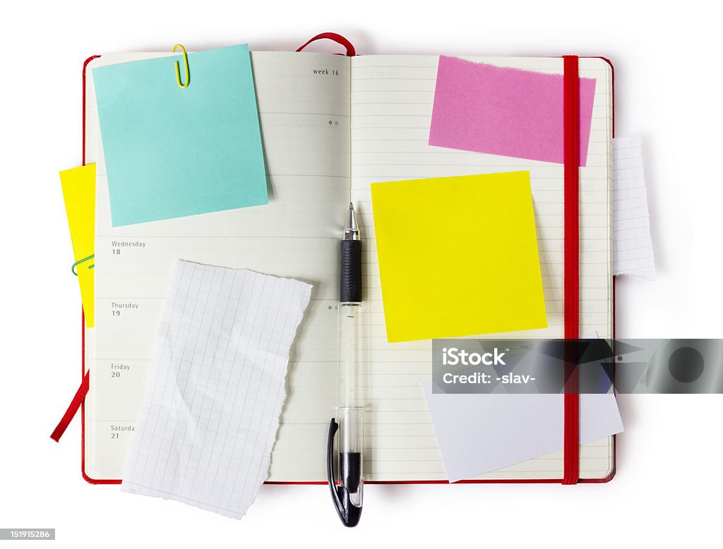 red Moleskine with clipping path red notebook  or calendar or organizer with precise clipping path Personal Organizer Stock Photo