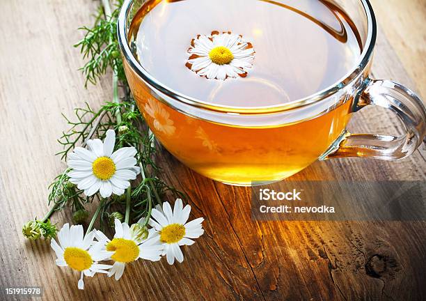 Chamomile Tea On Wooden Table Stock Photo - Download Image Now - Brown, Chamomile, Cup