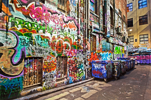 Grunge alley covered in graffiti.  Hosier Lane, Melbourne, Australia.  HDR effects.