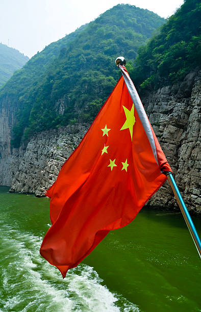 istock chinese flag flying over the yangtze 151917055