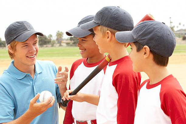 istock Young Boys In Baseball Team With Coach 151917145