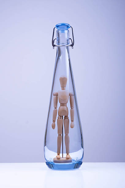 istock Mannequin in a glass bottle 151919182