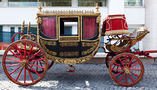 A XIXth century carriage behind Ara Pacis in Rome, ready for the opening parade of \