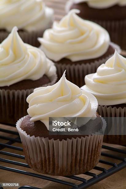 Chocolate Cupcakes With Vanilla Frosting Stock Photo - Download Image Now - Chocolate, Cupcake, Icing