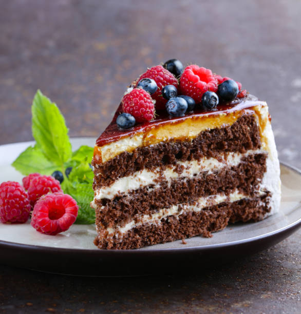 istock chocolate cake with vanilla cream and fresh berries 1519225786