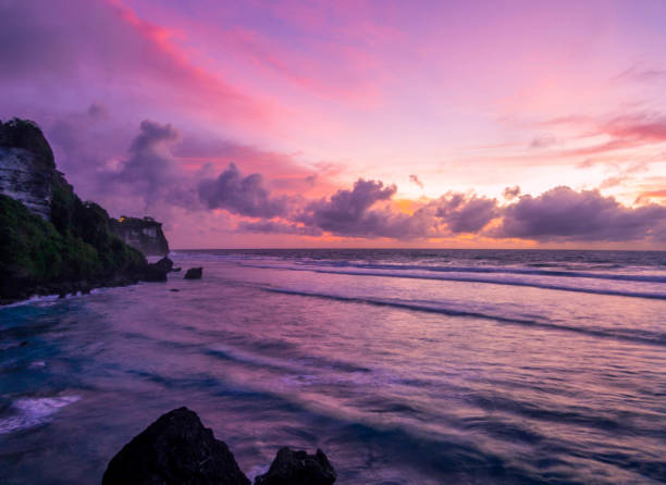 istock Sunset in Uluwatu Beach, Bali 1519271032