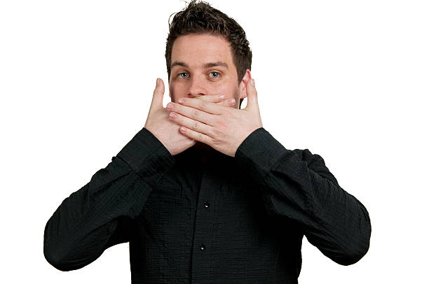 istock Man With Hands Over His Mouth 151930067