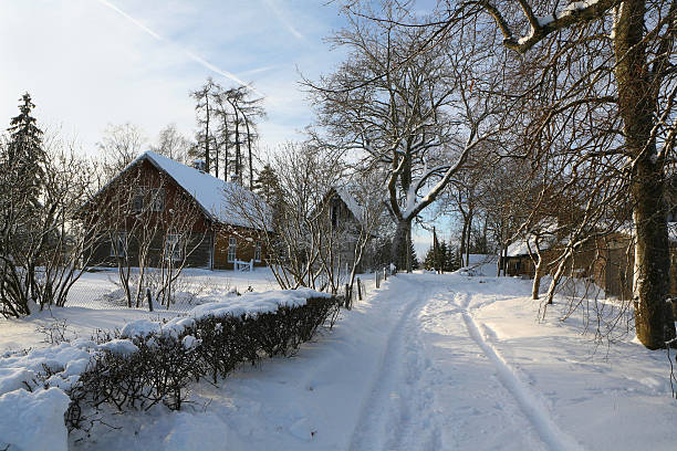 Lettone Villaggio in inverno - foto stock