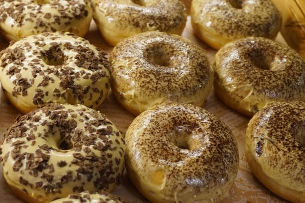 istock Closeup image of various doughnut on display. 1519338060