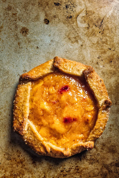 Peach tart Peach tart deli pie stock pictures, royalty-free photos & images